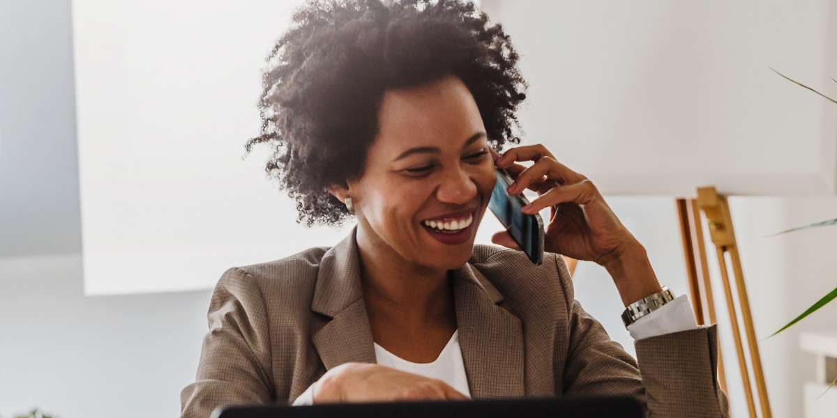 happy customer on the phone with IVA