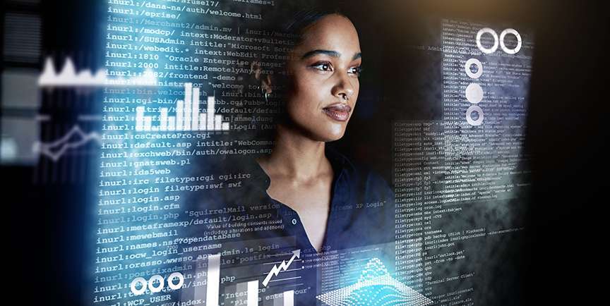 Woman illuminated by screen reflection